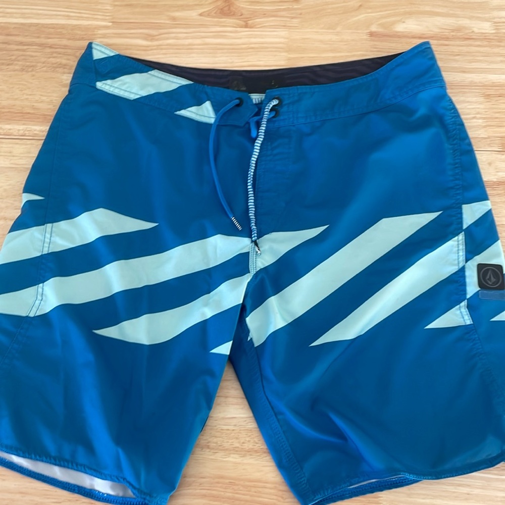 Volcom board short size 36.  Blue and light blue     In nice shape.